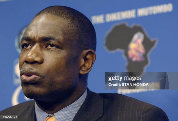 New York, UNITED STATES: Houston Rockets basketball star Dikembe Mutombo describes a 300-bed hospital he helped build in his hometown of Kinshasa,...