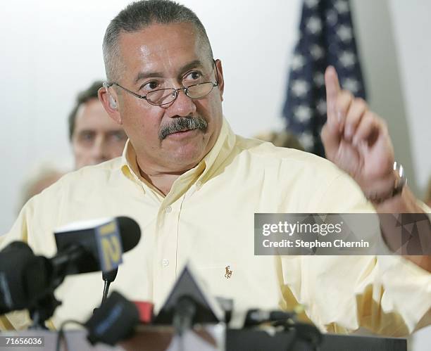 Retired New York City firefighter Al Fuentes, who was trapped in the rubble of the North Tower, speaks during a news conference on newly released...