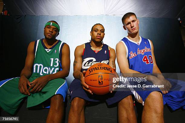 Maurice Ager of the Dallas Mavericks, Shannon Brown of the Cleveland Cavaliers and Paul Davis of the Los Angeles Lakers pose for a portrait during...