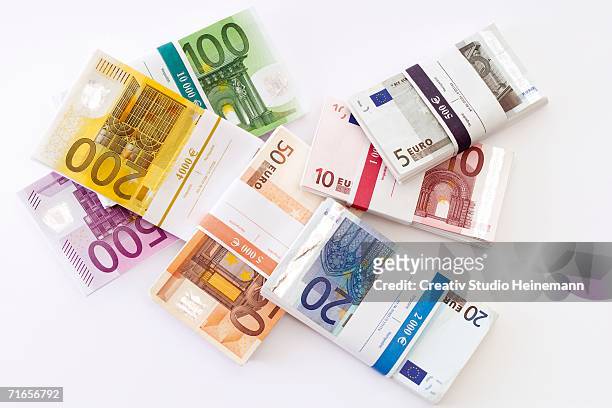 bundle of euro banknotes, overhead view - two hundred euro banknote stock pictures, royalty-free photos & images