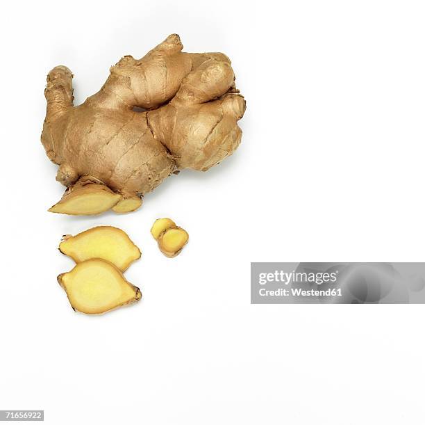 fresh ginger root, close-up - ginger fotografías e imágenes de stock