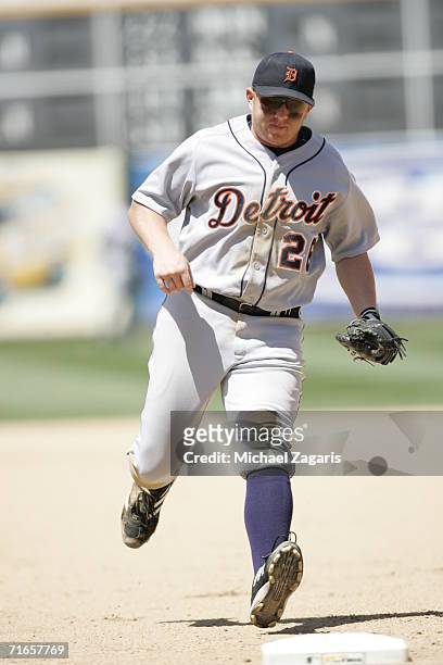 Chris Shelton of the Detroit Tigers runs to first base during the game against the Oakland Athletics at McAfee Coliseum in Oakland, California on...