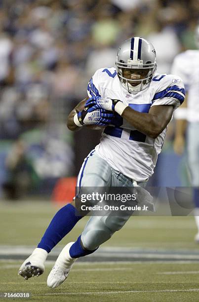 Keylon Kincade of the Dallas Cowboys carries the ball during the preseason game against the Seattle Seahawks on August 12, 2006 at Qwest Field in...