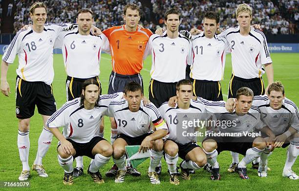 The team of Germany pose before the friendly match between Germany and Sweden at the Arena Auf Schalke on August 16, 2006 in Gelsenkirchen, Germany.