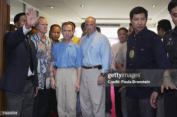 American John Mark Karr is presented to the media whilst being held by U.S and Thai authorities at an immigration office on August 17, 2006 in...