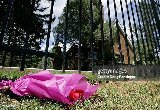 Single red rose lays near the entrance to the residence at 749 15th Street, where JonBenet Ramsey was murdered in December August 17, 2006 in...
