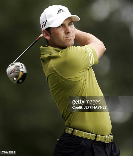 Medinah, UNITED STATES: Golfer Sergio Garcia of Spain watches his tee shot on the sixth hole 17 August, 2006 during the first round of the 88th PGA...