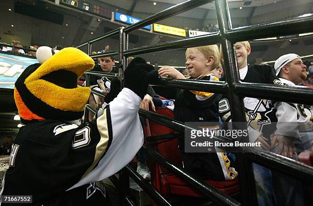 Mike Recktenwald as the Pittsburgh Penguins mascot "Iceburgh" entertains fans during the Pittsburgh Penguins game against the New York Islanders on...