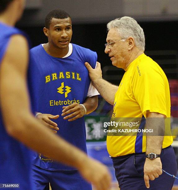 Brazilian basketball team head coach Aluisio Elias Xavier Ferreira "Lula" coaches with shooting guard Leandro Barbosa "Leandrinho" during an official...