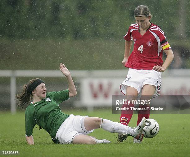 Gillian McDonnell of Ireland tackles for the ball with Valeria Kleiner of Germany during the Women's U15 four nations tournament match between...
