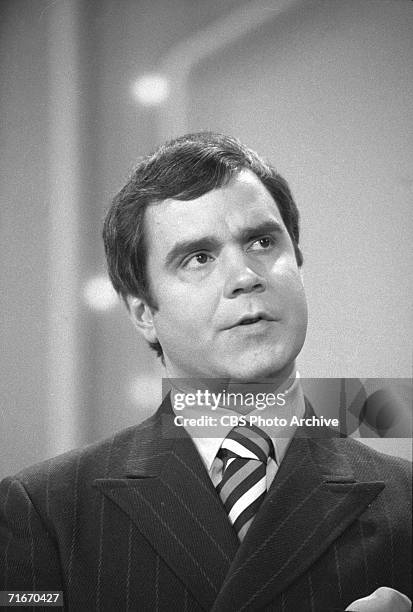 Canadian comedian and impersonator Rich Little cast a quizzical eye upwards on the set of 'The Ed Sullivan Show,' New York, New York, May 4, 1970.