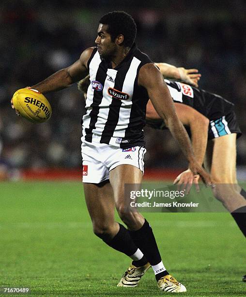 Harry O'Brien of Magpies marks during the round 20 AFL match between the Port Adelaide Power and Collingwood Magpies at AAMI Stadium on August 18,...