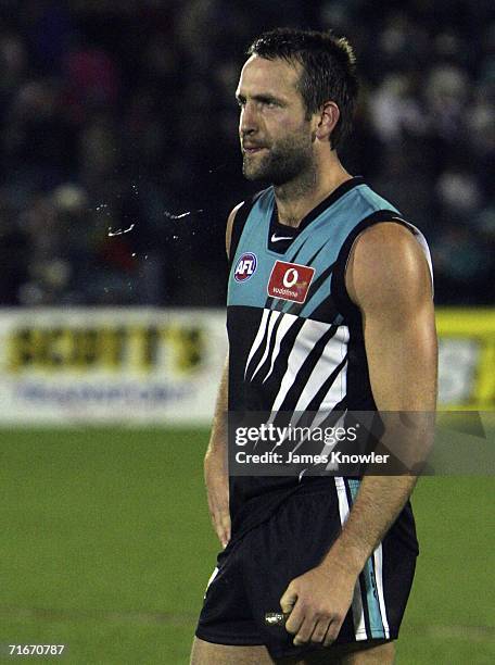 Darryl Wakelin of Port looks dejected after losing the round 20 AFL match between the Port Adelaide Power and Collingwood Magpies at AAMI Stadium on...