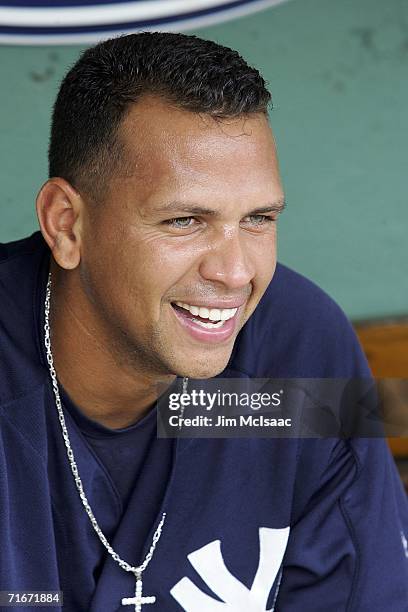 Alex Rodriguez of the New York Yankees sits in the dug out before playing the Boston Red Sox on August 18, 2006 at Fenway Park in Boston,...