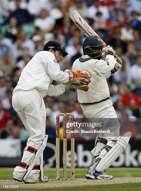 Mohammad Yousuf of Pakistan hits out watched by Chris Read of England during day two of the fourth npower test match between England and Pakistan at...