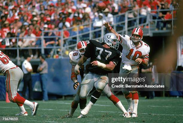 Defensive lineman Lyle Alzado of the Los Angeles Raiders rushes quarterback Steve Bartkowski of the Atlanta Falcons during a season game. Lyle Alzado...