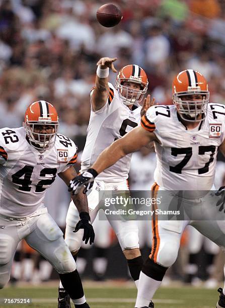 Charlie Frye of the Cleveland Browns throws over teammates Terrelle Smith and Kevin Shaffer during a pre sesason game against the Detroit Lions at...