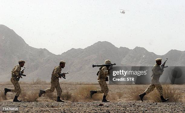 Iranian soldiers participate in military manoeuvres at Sistan-Baluchestan province, some 50 kms east of city of Zahedan near the Pakistani border, 19...