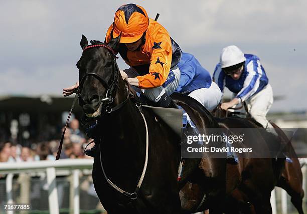 Welsh Emperor ridden by Jamie Spence races away to win the Sportsman Newspaper Hungerford Stakes at Newbury Racecourse on August 19 Newbury, United...