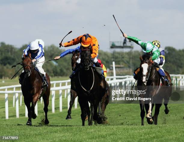Welsh Emperor ridden by Jamie Spence races away from Jeremy ridden by Michael Kinane to win the Sportsman Newspaper Hungerford Stakes at Newbury...