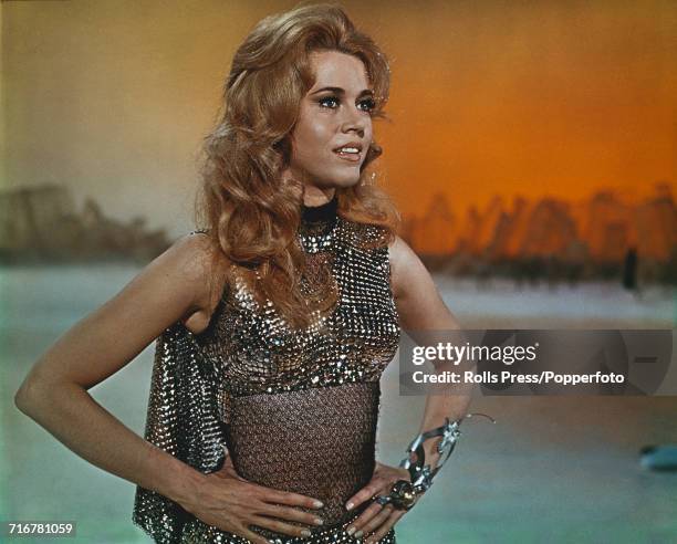 View of a scene from the Roger Vadim directed science fiction film Barbarella with American actress Jane Fonda pictured in character as Barbarella...