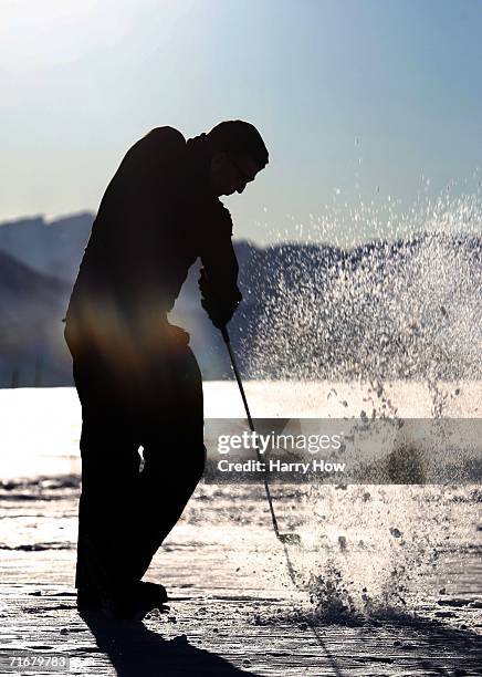 Cesar Serrano practices from the rough during the Chivas Snow Golf Championship at La Parva Ski Resort on August 19, 2006 in Santiago, Chile.