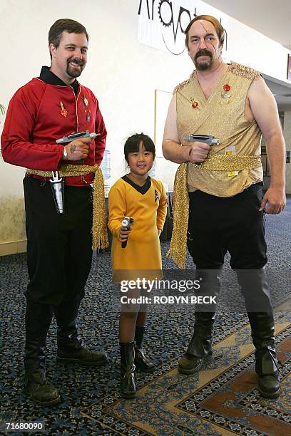 Las Vegas, UNITED STATES: Star Trek fans, from left, Mark Vennemeyer of Richmond, California, Kei Qhua of Las Vegas and Mike Wilson of Livermore,...