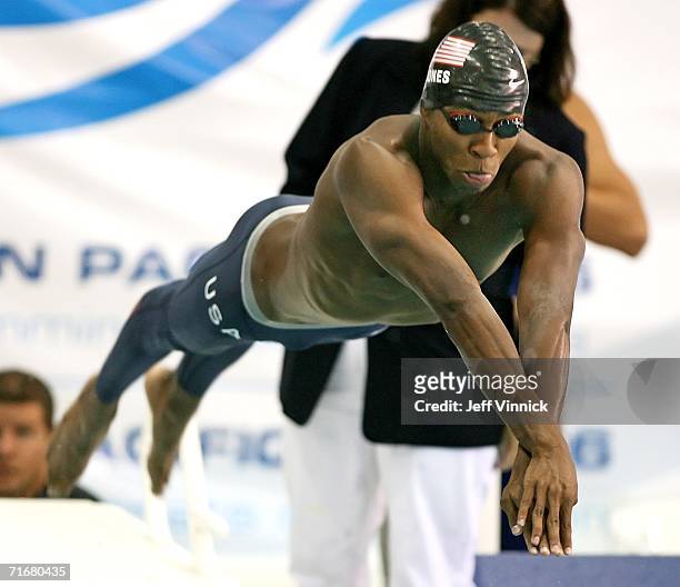 Cullen Jones of the USA leaps from the starting blocks as he swims his 100m in the Men's 4 x 100m Freestyle relay final at the Pan Pacific Swimming...
