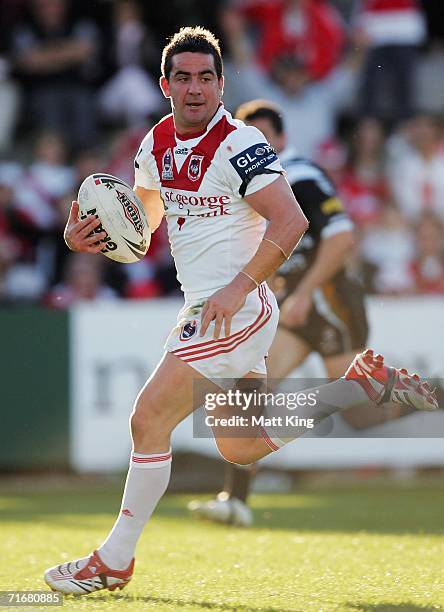 Aaron Gorrell of the Dragons races to the line to score a try during the round 24 NRL match between the St. George Illawarra Dragons and the Wests...