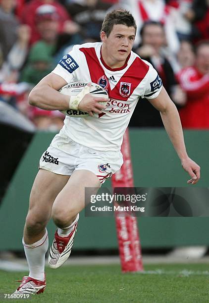 Brett Morris of the Dragons crosses the line to score a try during the round 24 NRL match between the St. George Illawarra Dragons and the Wests...