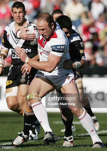 Luke Bailey of the Dragons takes on the Tigers defence during the round 24 NRL match between the St. George Illawarra Dragons and the Wests Tigers at...