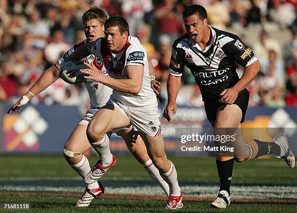 Brett Morris of the Dragons makes a break during the round 24 NRL match between the St. George Illawarra Dragons and the Wests Tigers at Oki Jubilee...