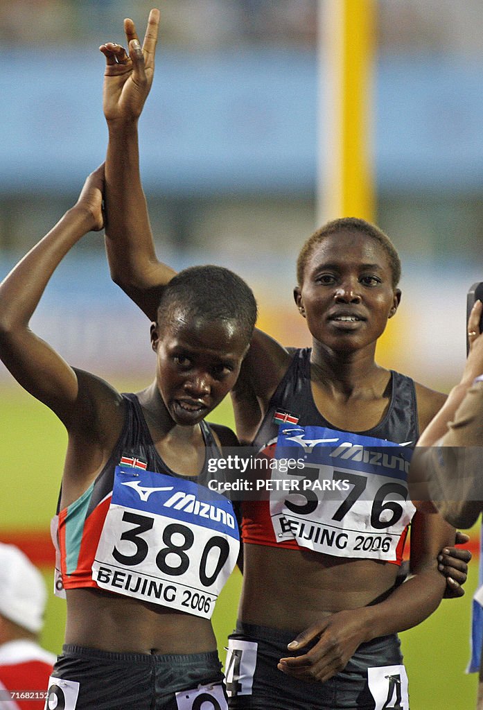 Irene Jelagat of Kenya (R) and her compa