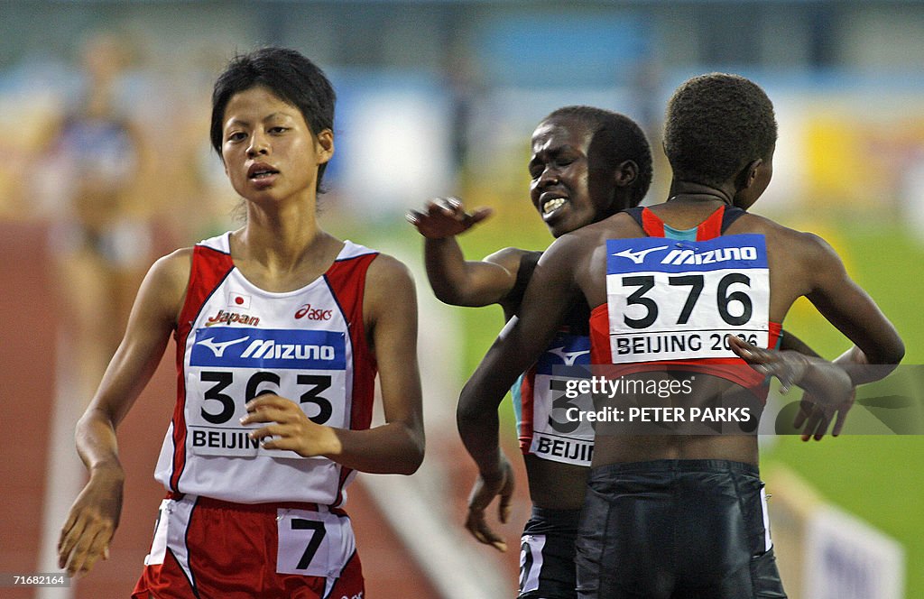 Irene Jelagat of Kenya (R) and her compa