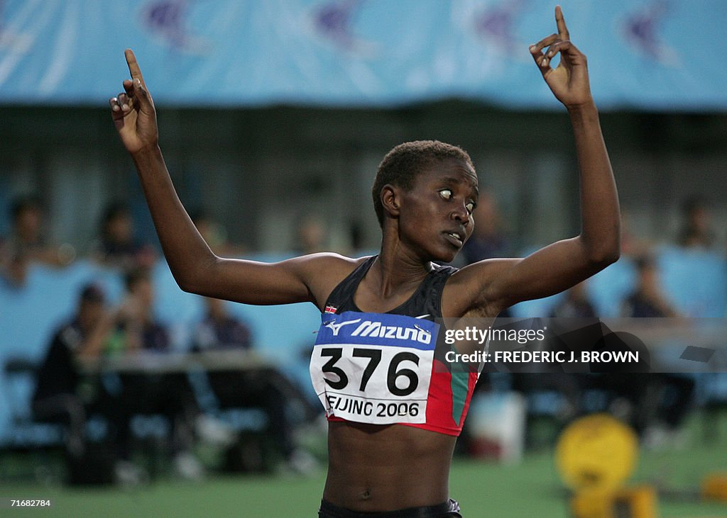 Kenya's Irene Jelagat (#376) looks back