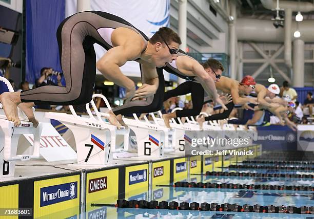 Pascall Wollach of Canada jumps from the starting block at the start of his race in the Men's 50m Freestyle heat at the Pan Pacific Swimming...