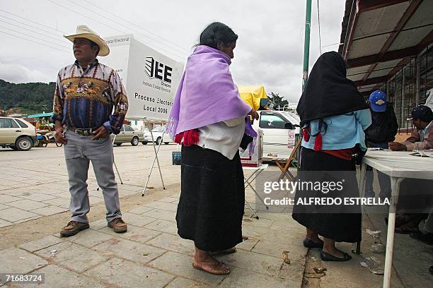 San Juan Chamula, MEXICO: Tzotzil natives wait to cast their ballots during Chiapas' state election in San Juan Chamula, Mexico, on August 20th,...