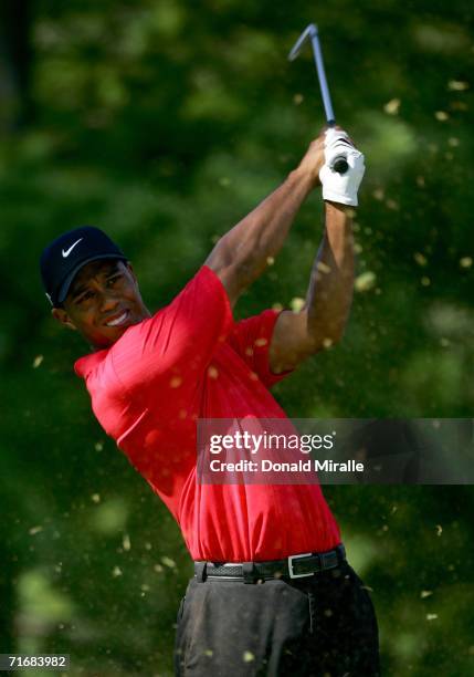 Tiger Woods hits from the ninth tee during the final round of the 2006 PGA Championship at Medinah Country Club on August 20, 2006 in Medinah,...