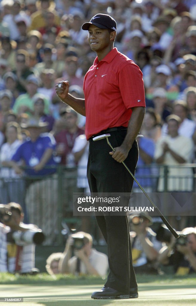 Tiger Woods of the United States celebra