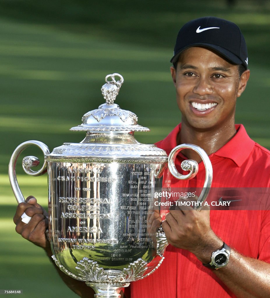 Tiger Woods of the United States holds u