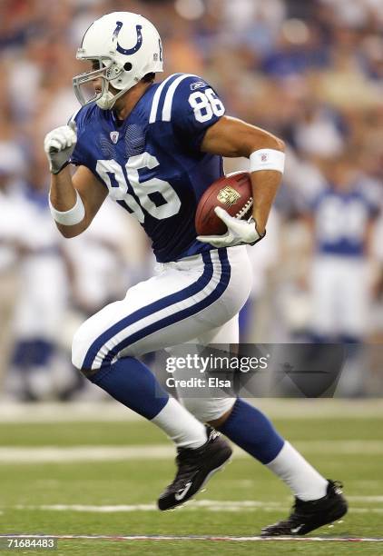 Ben Utecht of the Indianapolis Colts carries the ball in the first quarter against the Seattle Seahawks on August 20,2006 the RCA Dome in...