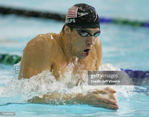 Michael Phelps of the USA swims to a first place finish as he sets a new world record of 1 minute, 55.84 seconds in the Men's 200m Individual Medley...