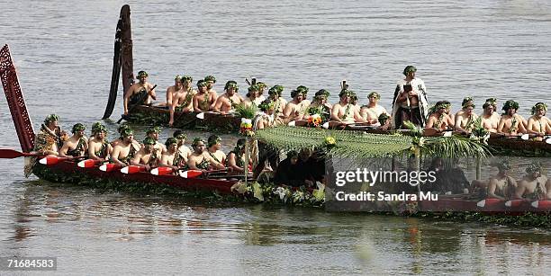 The late Queen Dame Te Atairangikaahu lays in the waka as she travels down the Waikato river on August 21, 2006 in Ngaruawahia, New Zealand. Queen...