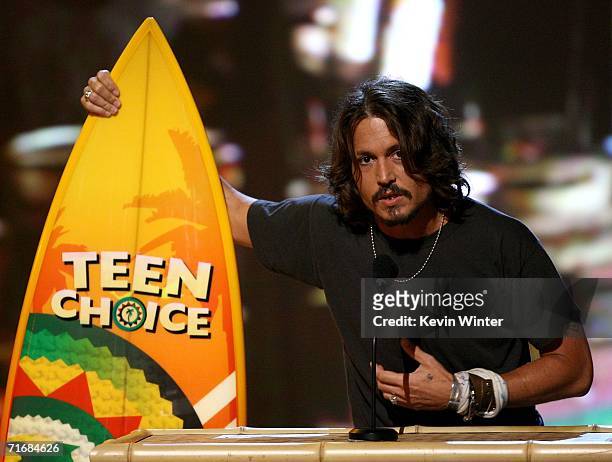 Actor Johnny Depp accepts the Choice Movie Actor Drama/Action Adventure onstage at the 8th Annual Teen Choice Awards at the Gibson Amphitheatre on...