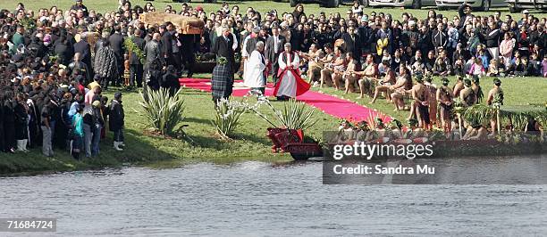 The late Queen Dame Te Atairangikaahu is carried in her coffin to the waka at Turangawaeware Marae on August 21, 2006 in Ngaruawahia, New Zealand....