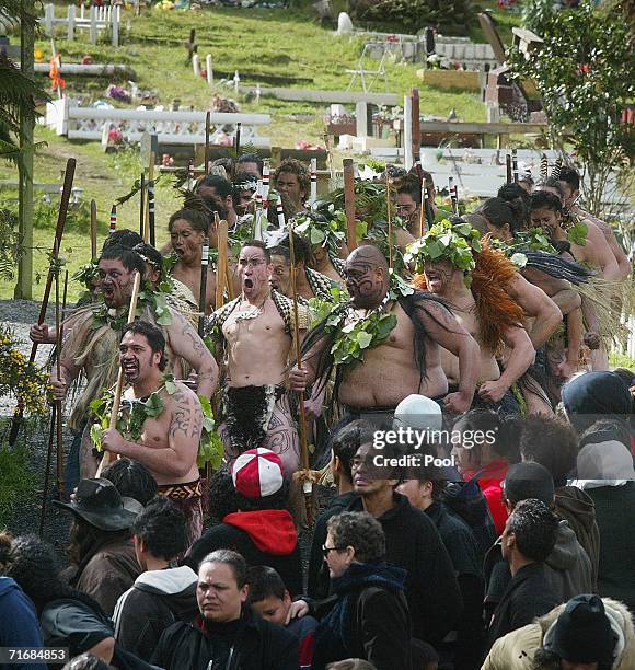 Maori warriors accompany the coffin of the Maori Queen, Dame Te Atairangikaahu towards her final resting place on top of the sacred Taupiri Mountain...