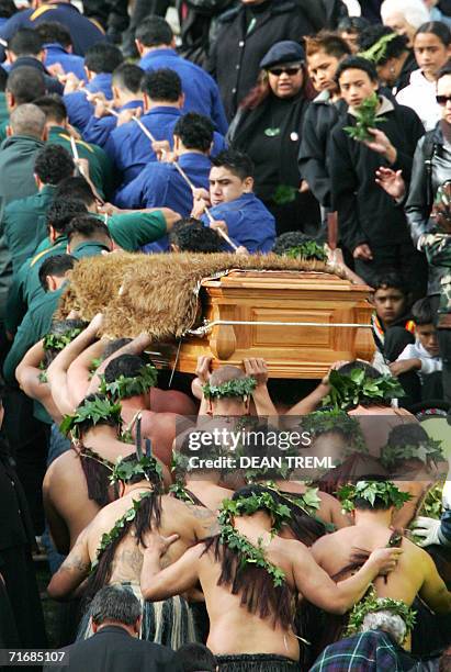 Maori Warriors and attendants escort the coffin of Queen Te Arikinui Dame Te Atairangikaahu up Mount Taupiri to her final resting place during her...