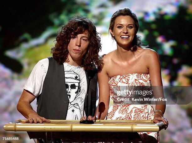 Snowboarder Shaun White, winner Choice Male Action Sports Athlete, and Hilarie Burton speak onstage at the 8th Annual Teen Choice Awards at the...