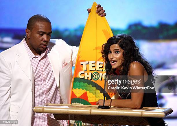 Singers Timbaland and Nelly Furtado accept the Choice Music R&B/Hip Hop Track award onstage at the 8th Annual Teen Choice Awards at the Gibson...