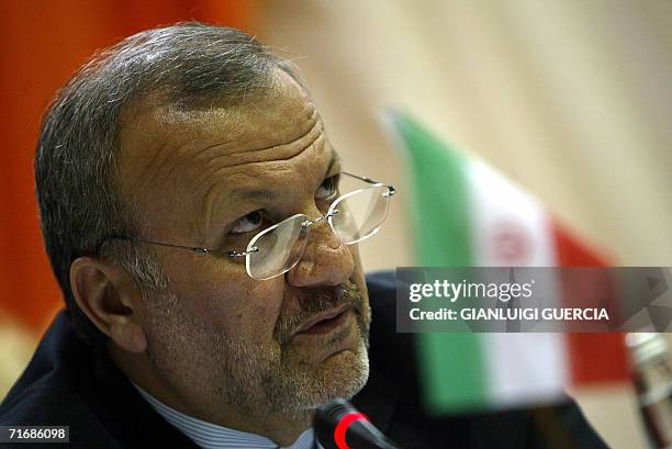 Pretoria, SOUTH AFRICA: Iranian Foreign Minister Manuchehr Motakki gives his remarks, 21 August 2006, at the opening session of the 9th South...